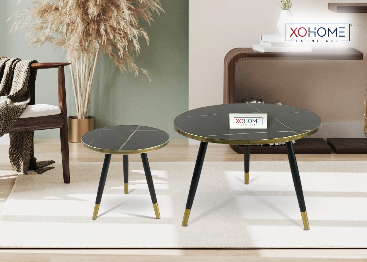 XOHOME Zara Set of 2 coffee tables. It consists of a glass top finished in marble touch. Top is Black in color.