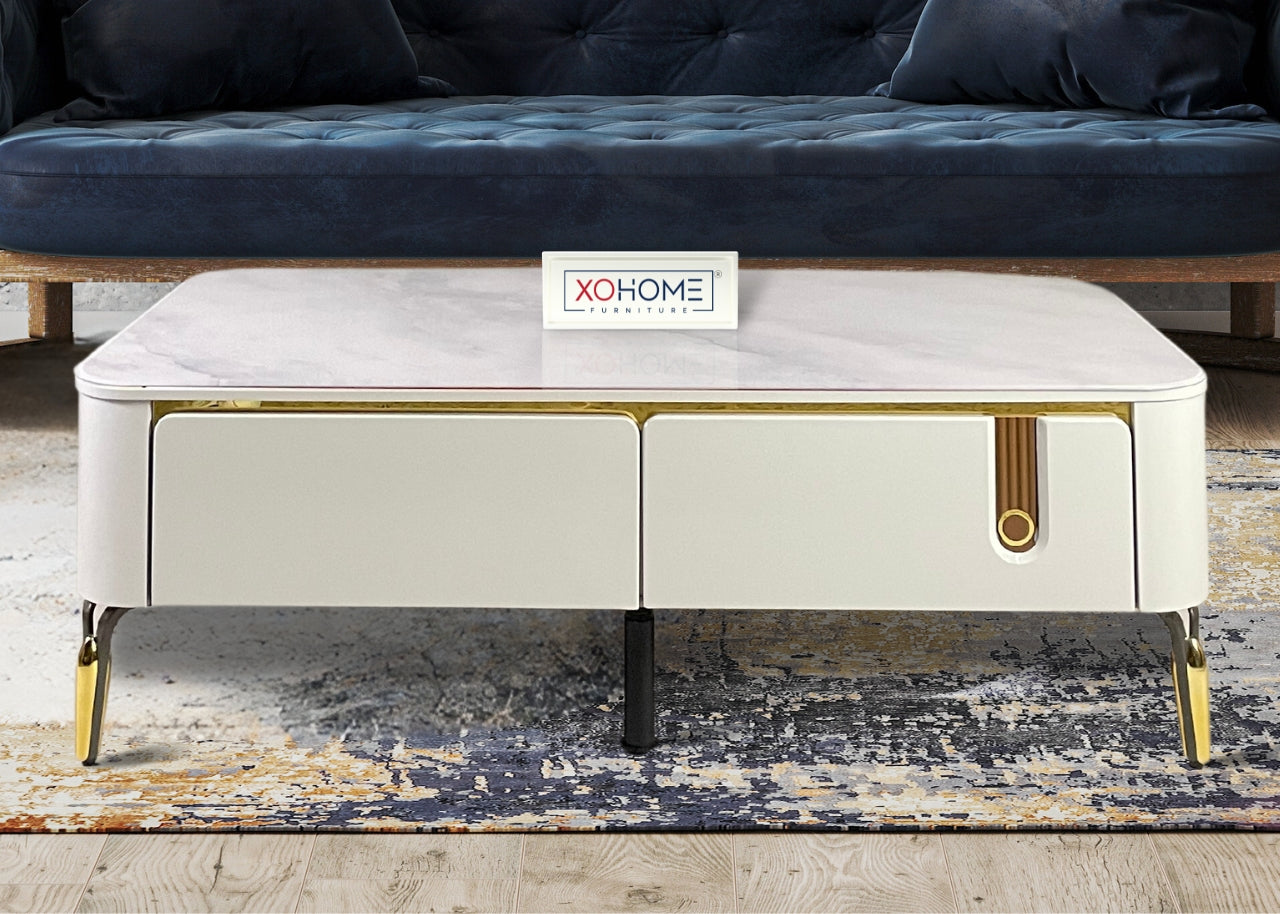 XOHOME Vail Glass top coffee table with 4 storage drawers. The glass top completely looks like a marble.