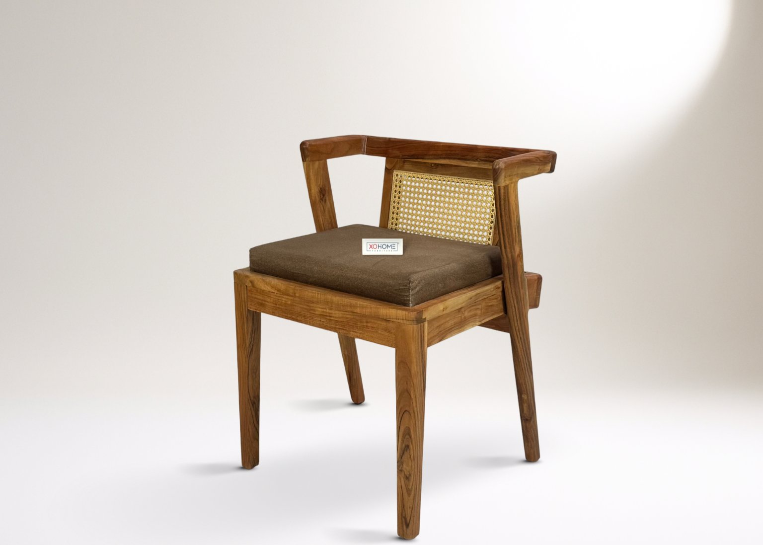 XOHOME Indra solidwood chair with premium rattan backrest, padded seat and arm support, elegant wooden grains for luxury home seating.