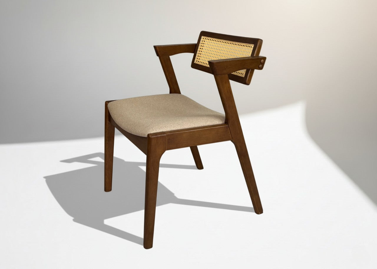 Elegant solidwood Sadam chair by XOHOME featuring handwoven rattan and bucket-style curved seat for superior comfort.