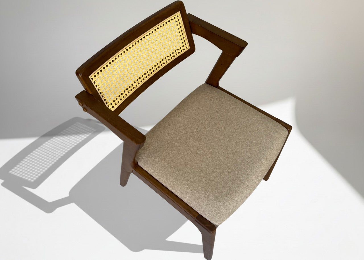 Top view of XOHOME Sadam Rattan Chair showing sturdy wooden frame and smooth curved backrest design